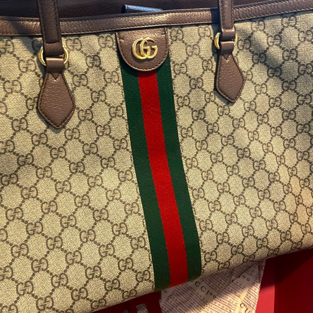Authentic tote bag …excellent condition,medium tote bag with red and green web